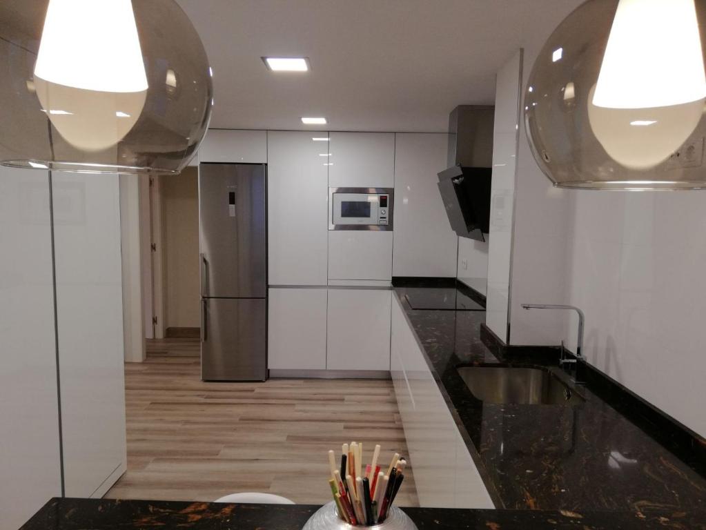 Kuchyňa alebo kuchynka v ubytovaní Apartamento Aurora