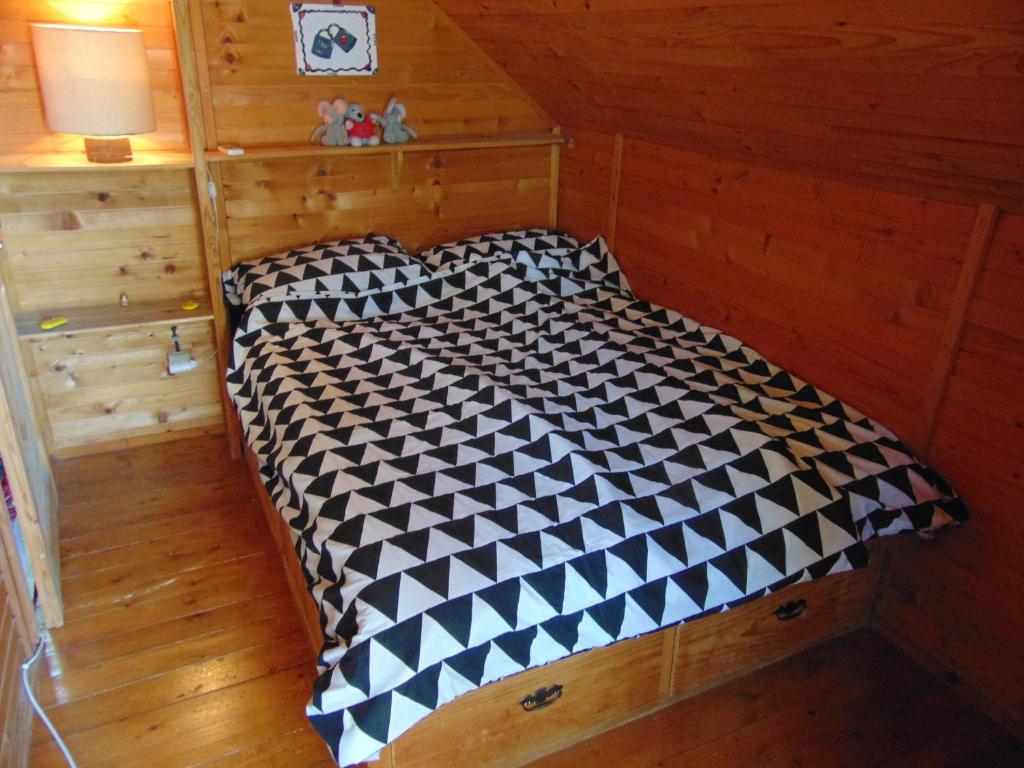 Postel nebo postele na pokoji v ubytování Tarski dom