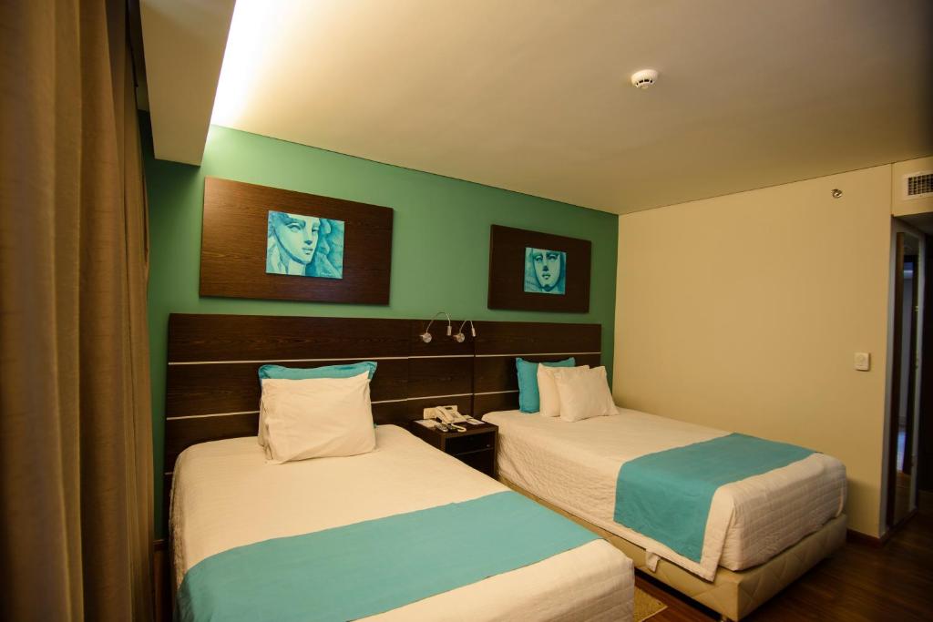 Postel nebo postele na pokoji v ubytování Awa Resort Hotel
