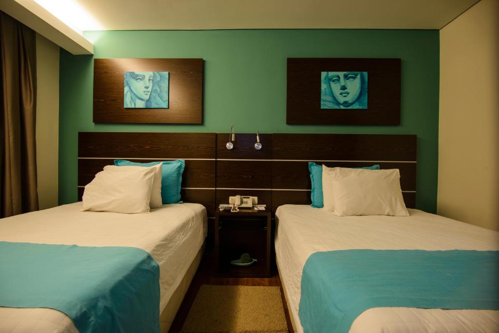 Postel nebo postele na pokoji v ubytování Awa Resort Hotel