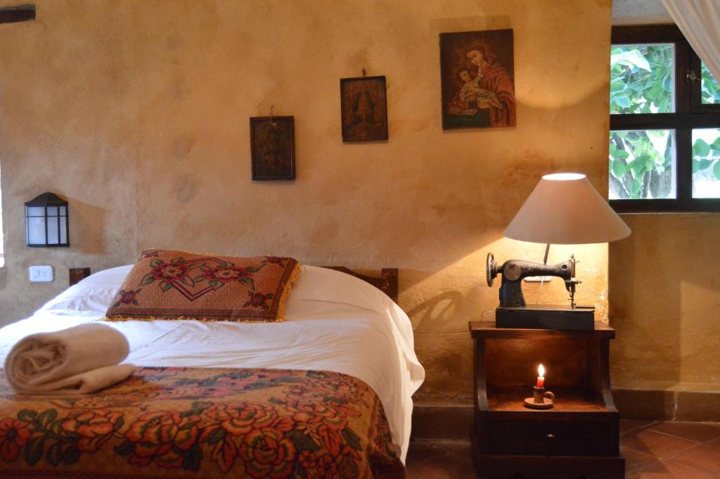 Postel nebo postele na pokoji v ubytování Hacienda San Francisco