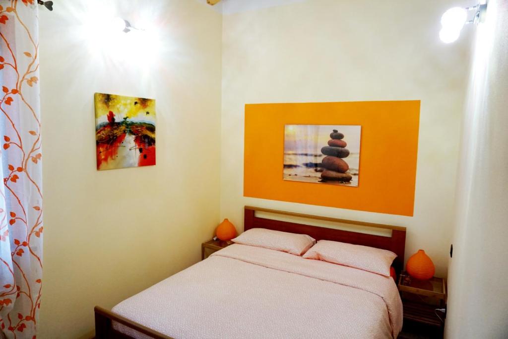 Posteľ alebo postele v izbe v ubytovaní Residenze Mquadro