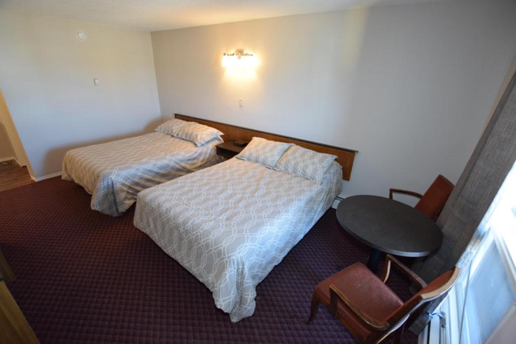 Postel nebo postele na pokoji v ubytování Airways Motel