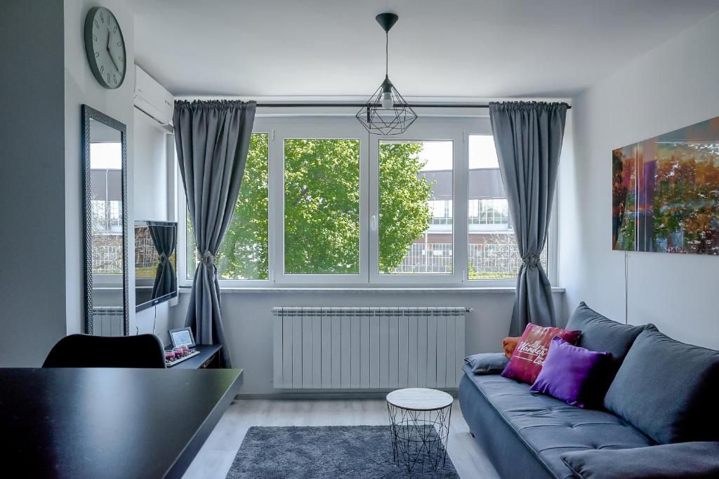 Część wypoczynkowa w obiekcie Drop (in) Apartment