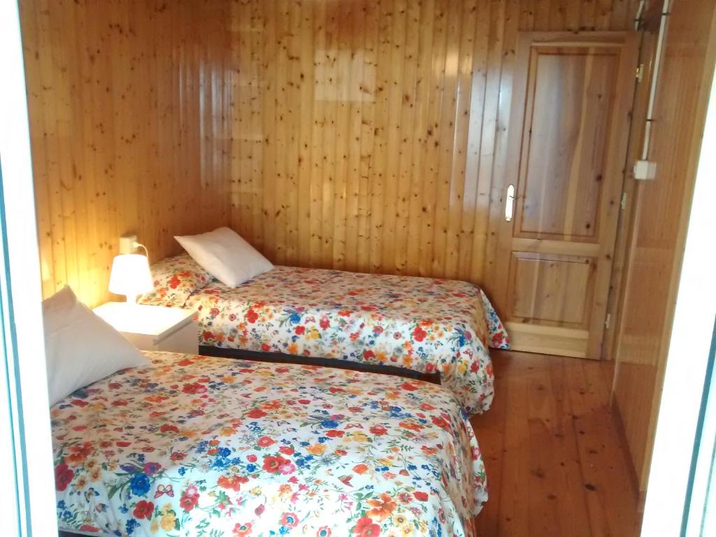 Posteľ alebo postele v izbe v ubytovaní A Casa De Regina