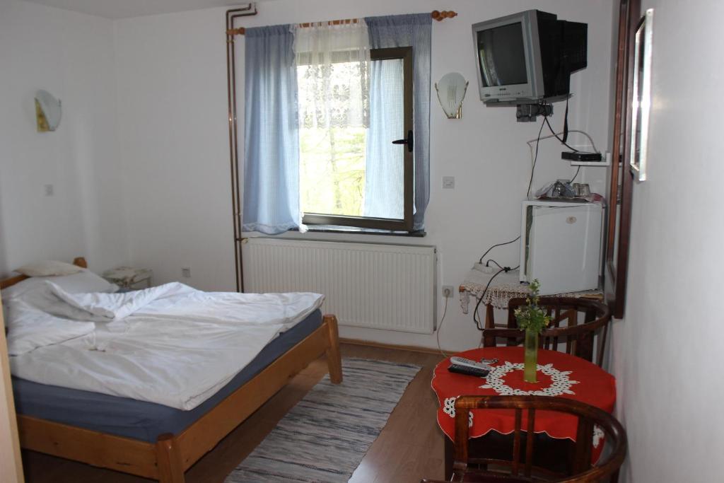 Postel nebo postele na pokoji v ubytování Guest House 3M