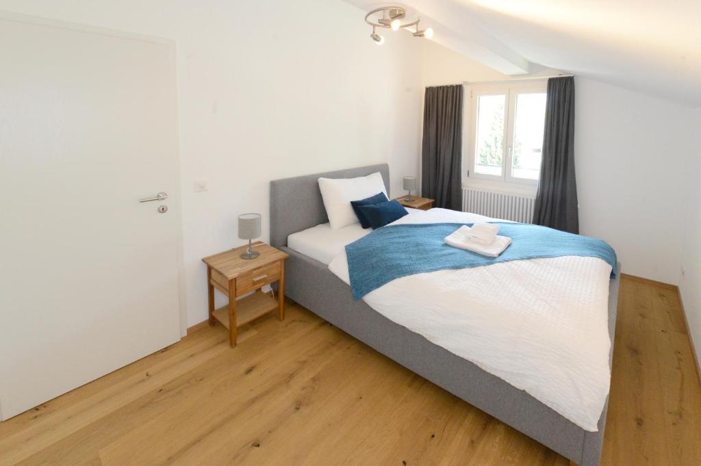 Postel nebo postele na pokoji v ubytování Zer Treichi Appartements