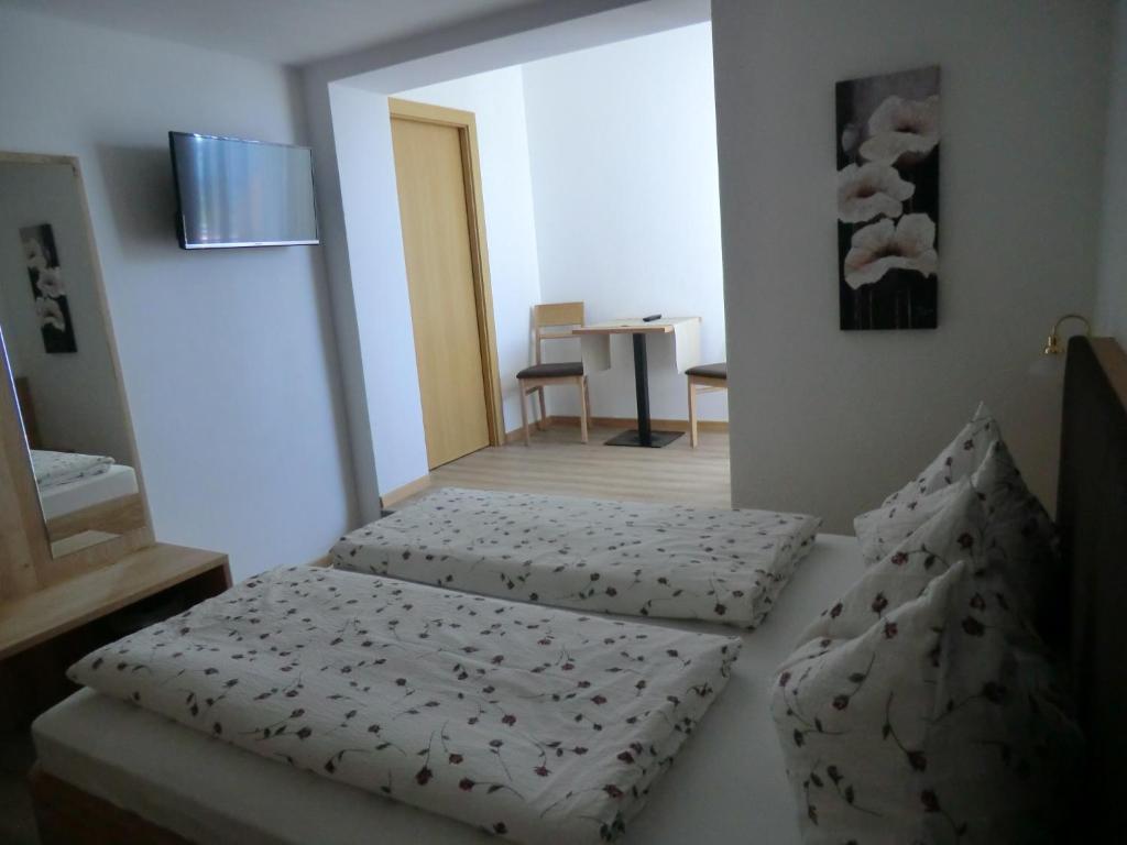 Postel nebo postele na pokoji v ubytování Garni Pircher