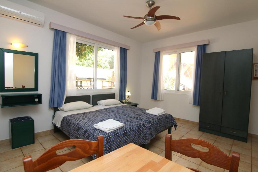Postel nebo postele na pokoji v ubytování Evropi Hotel