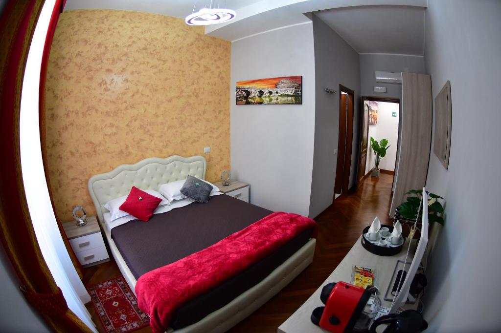 Uma cama ou camas num quarto em Royal Termini