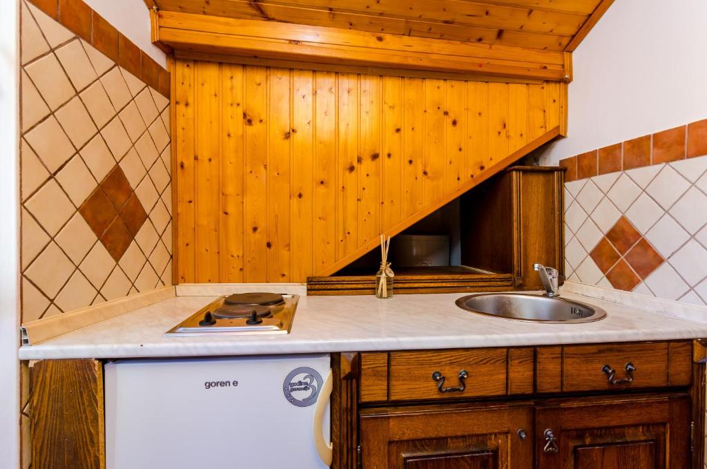 Kuchyň nebo kuchyňský kout v ubytování Holiday Home St George