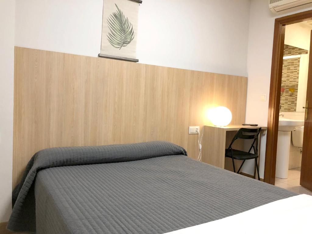 Postel nebo postele na pokoji v ubytování Bearan Bar & Rooms