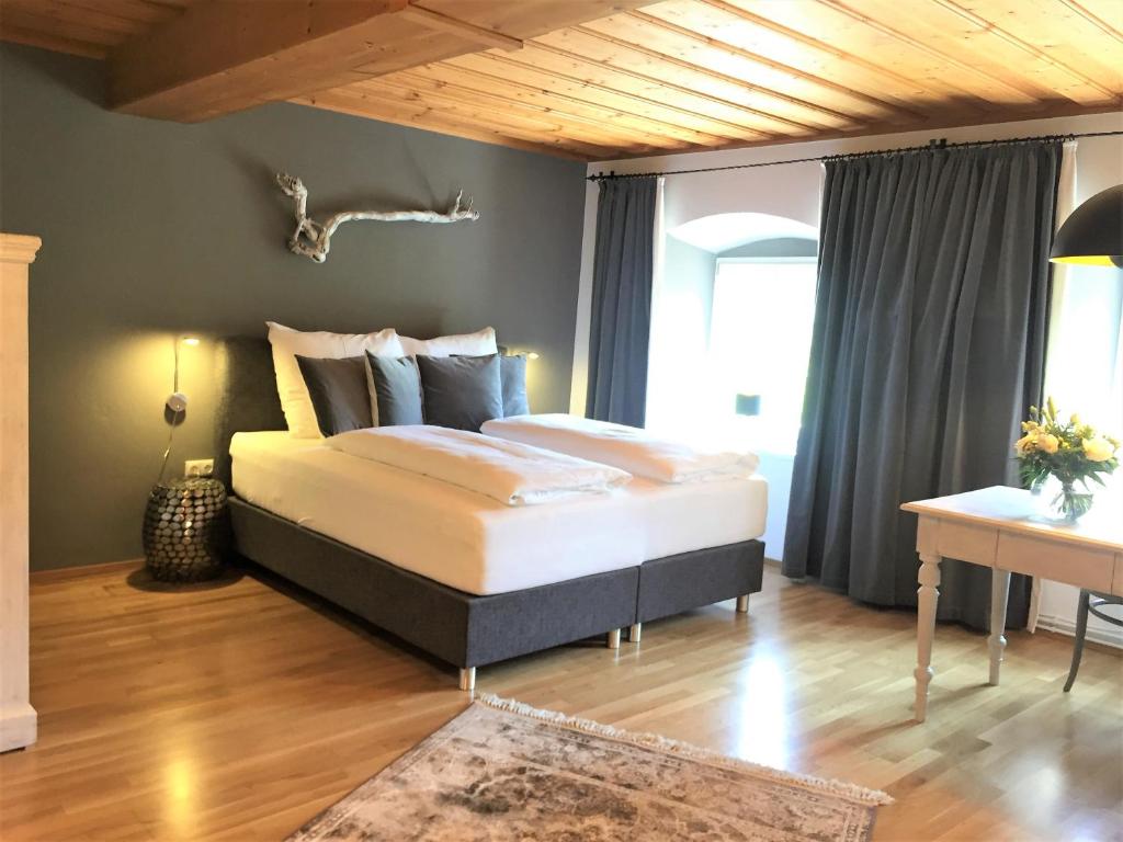 Posteľ alebo postele v izbe v ubytovaní Apartments Mauritiushof Weingut FJ Gritsch