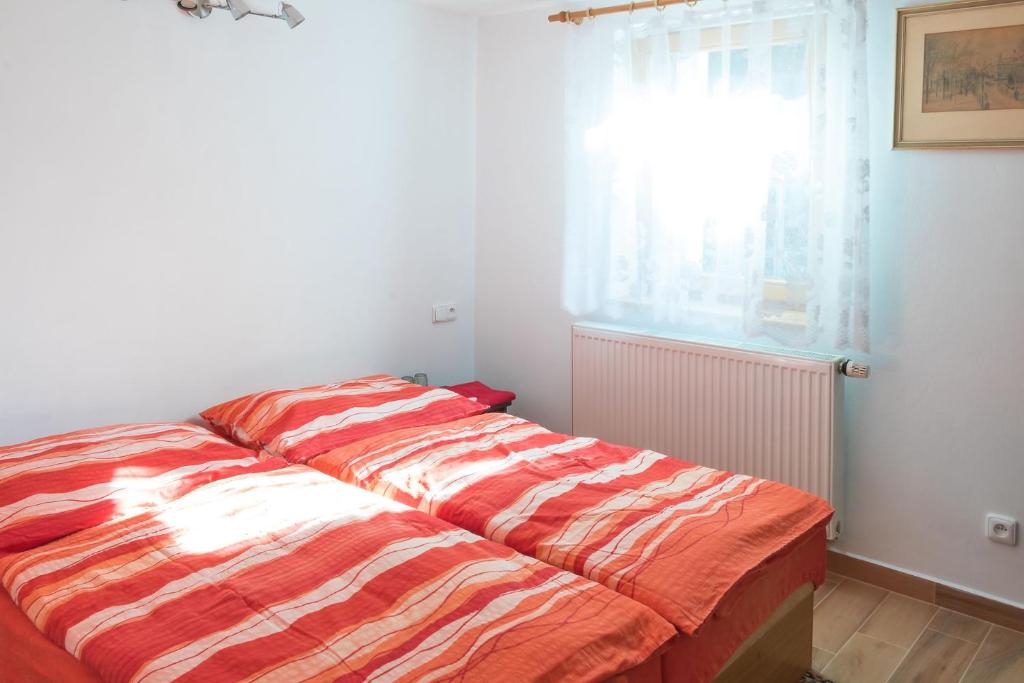 Postel nebo postele na pokoji v ubytování Alton garni hotel