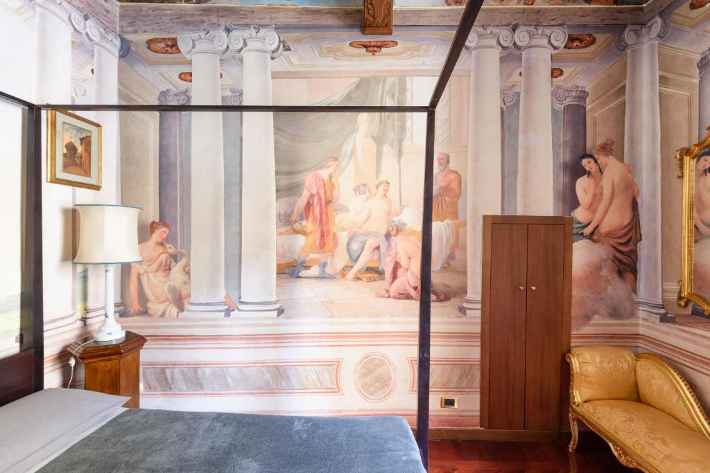 A bed or beds in a room at Domus Nannini SPA - Palazzo Nannini