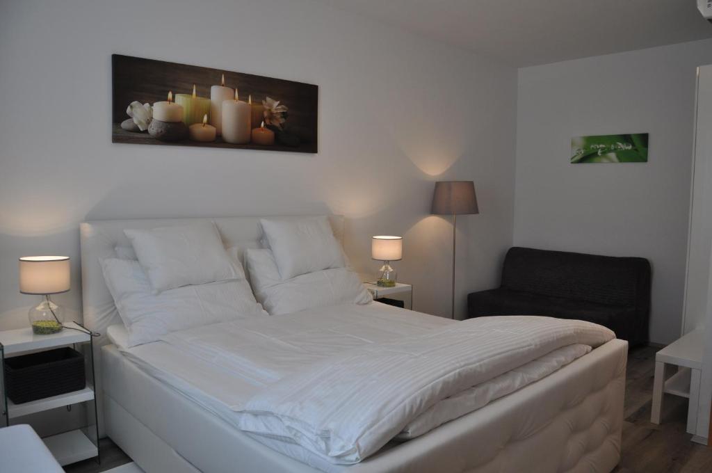 Postel nebo postele na pokoji v ubytování Gästezimmer Resi