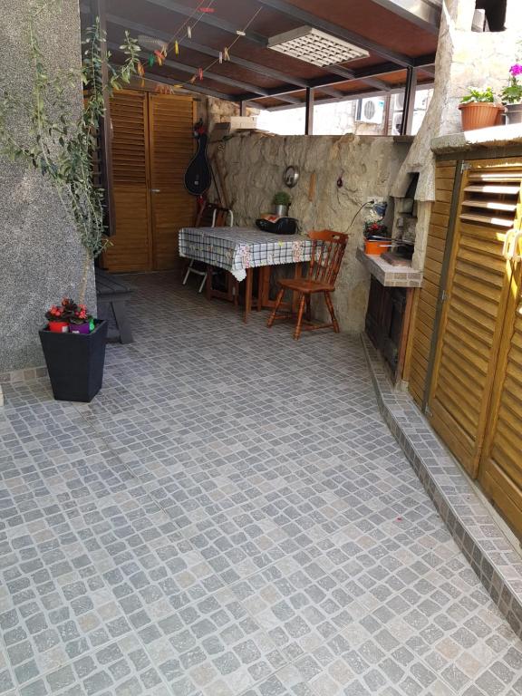 Patio alebo iná vonkajšia časť ubytovania Radun