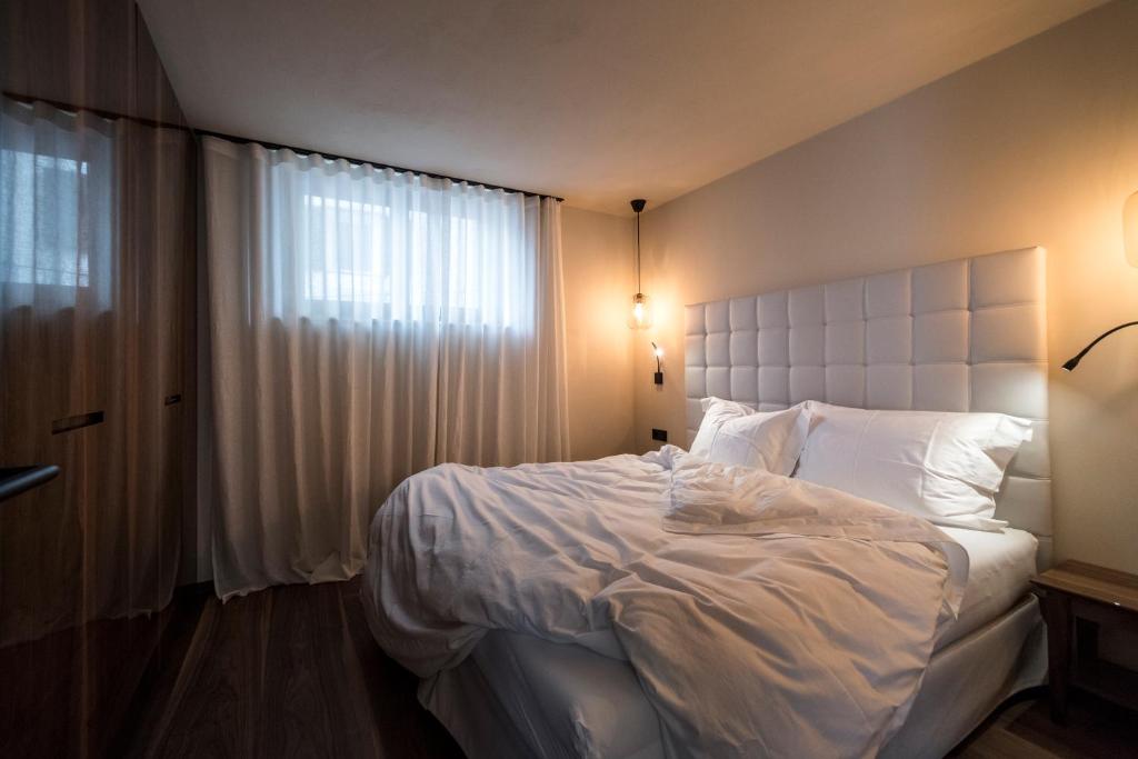 Postel nebo postele na pokoji v ubytování Messnerhaus Suite