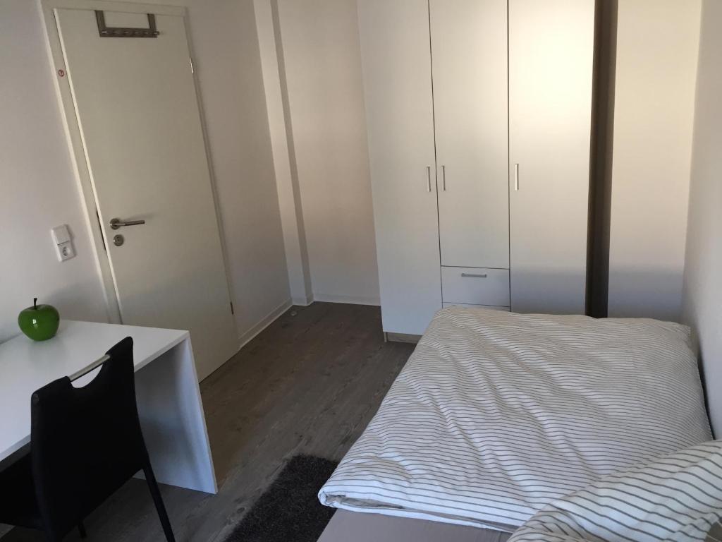 Postel nebo postele na pokoji v ubytování Leipzig-in