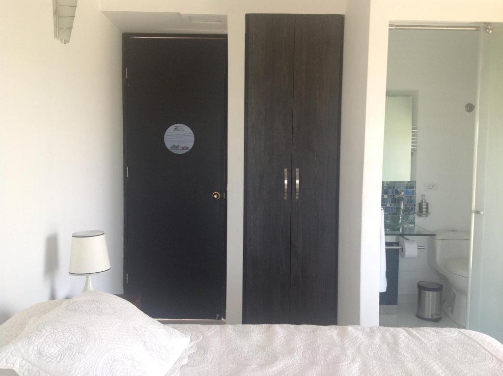 Postel nebo postele na pokoji v ubytování Lili House