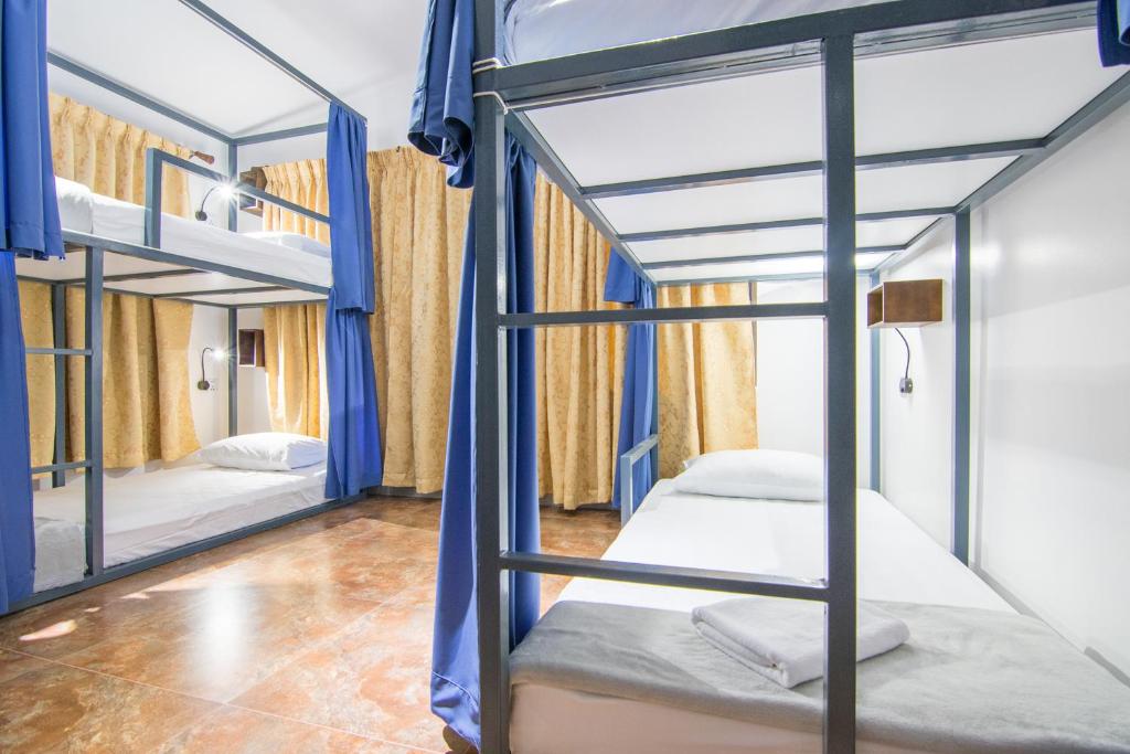 Postel nebo postele na pokoji v ubytování Bokre Angkor Hostel