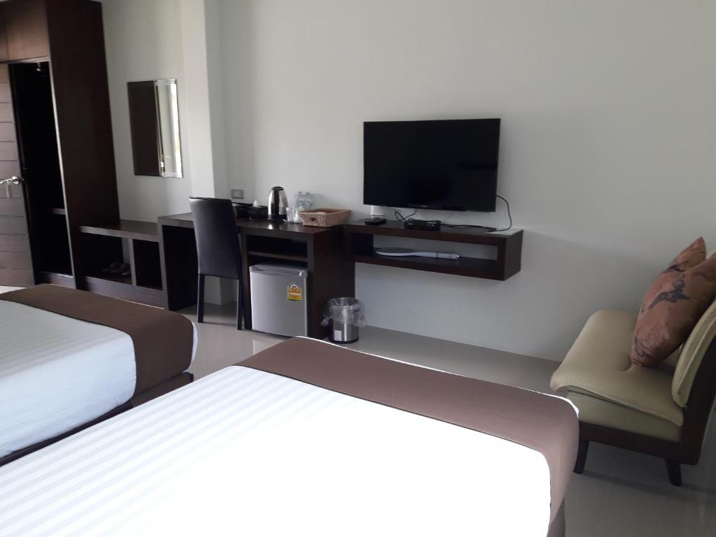 TV a/nebo společenská místnost v ubytování Chiangrai Green Park Resort