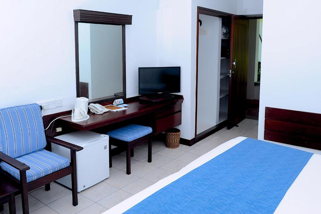TV a/nebo společenská místnost v ubytování Voyager Beach Resort