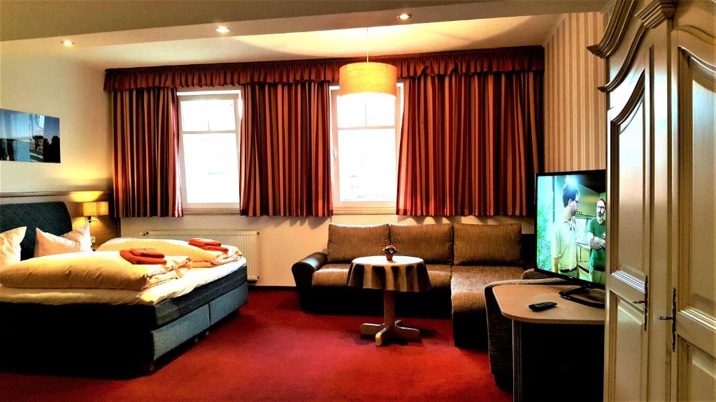 TV a/nebo společenská místnost v ubytování Apart Hotel Wernigerode
