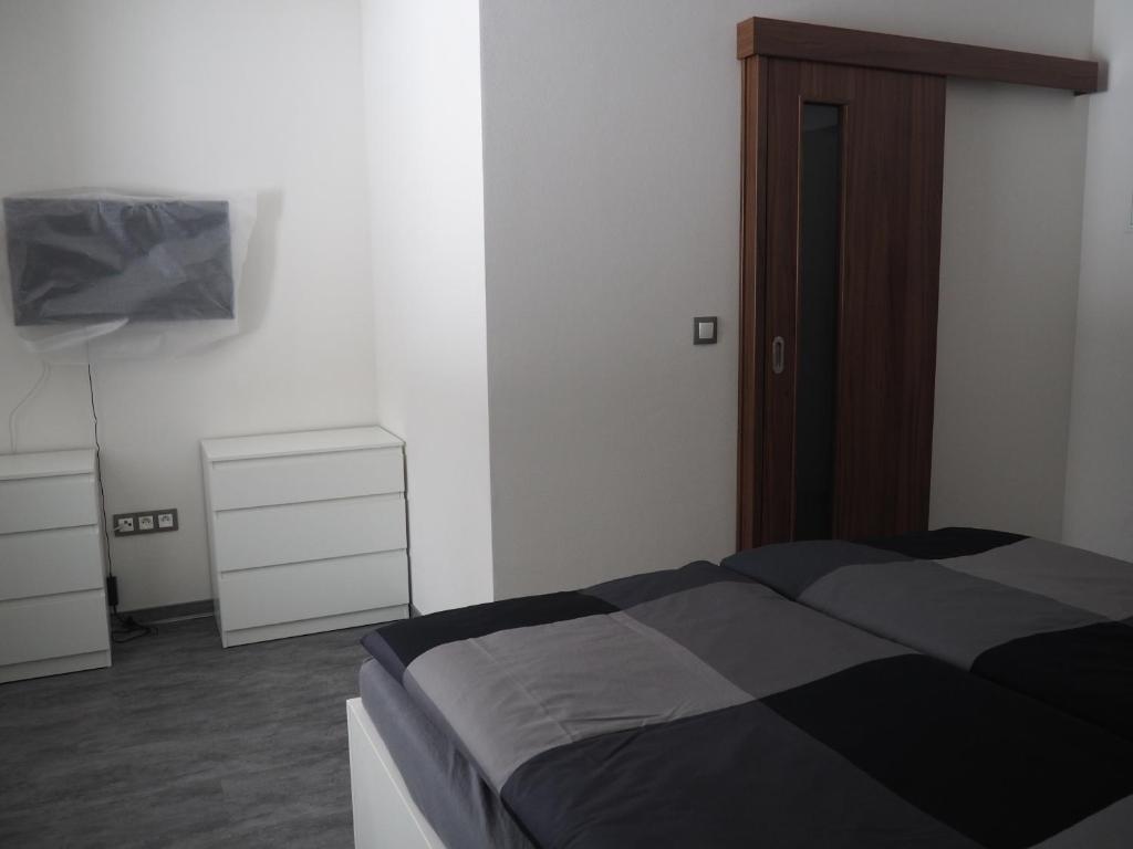 Łóżko lub łóżka w pokoju w obiekcie Pension Anja
