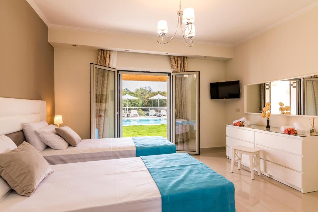 A bed or beds in a room at Villa Johnnie