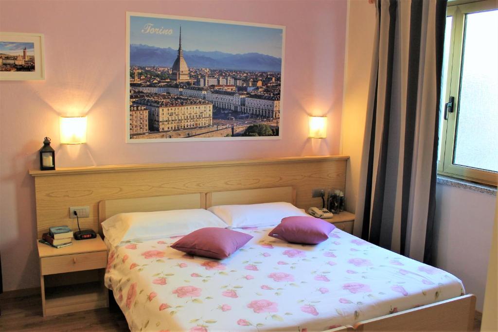 Postel nebo postele na pokoji v ubytování Hotel Panorama e Residence