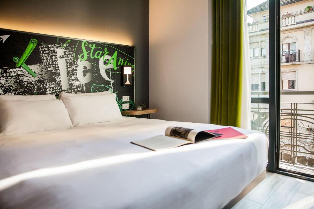 Postel nebo postele na pokoji v ubytování Spice Hotel Milano