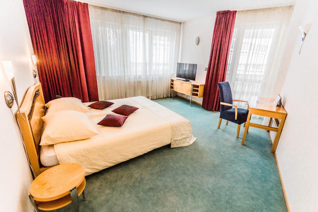 Postel nebo postele na pokoji v ubytování Hotel SET