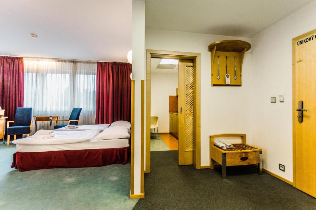 Postel nebo postele na pokoji v ubytování Hotel SET