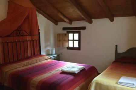 Postel nebo postele na pokoji v ubytování La Toscana