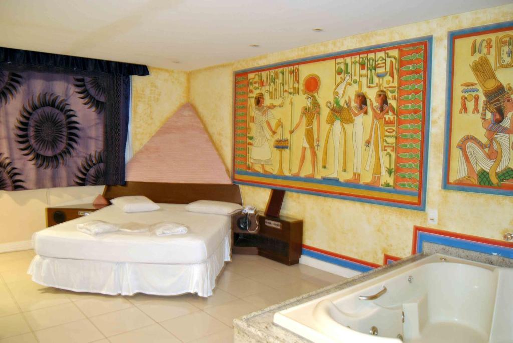 Postel nebo postele na pokoji v ubytování Motel KamaSutra