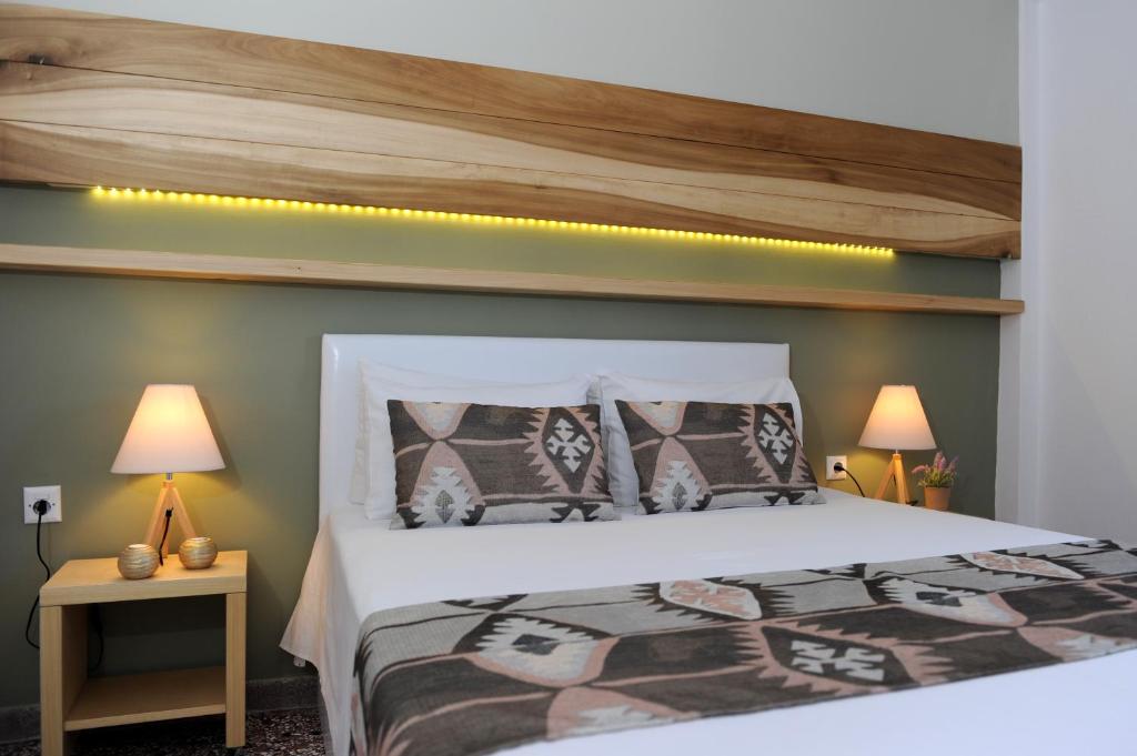 Łóżko lub łóżka w pokoju w obiekcie Stamatia Apartments