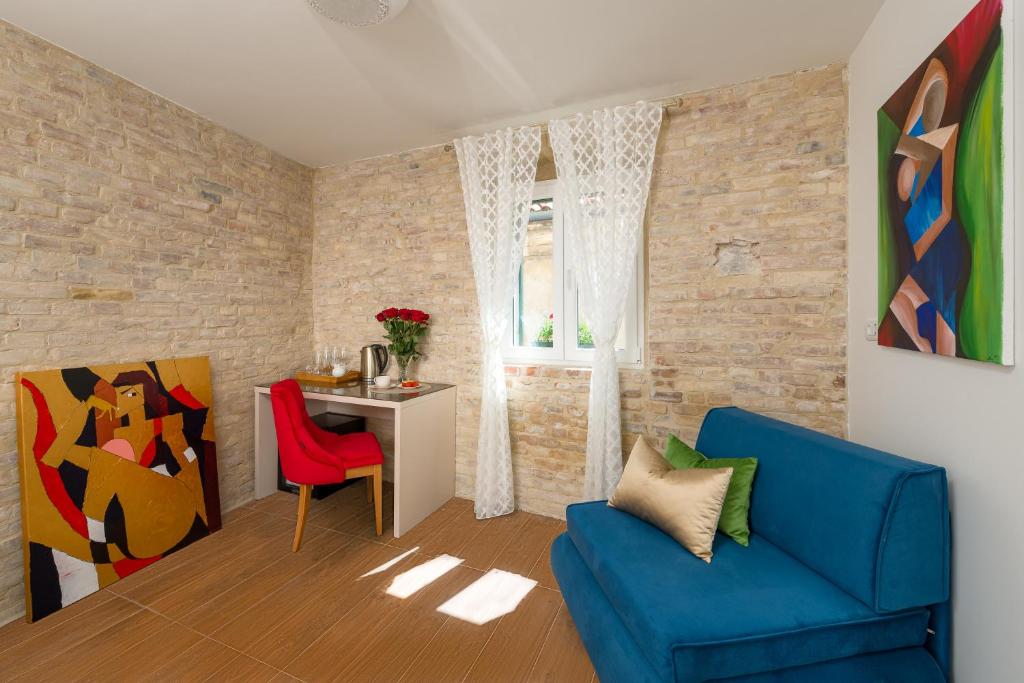 Posezení v ubytování Agava Lux Rooms&Pool