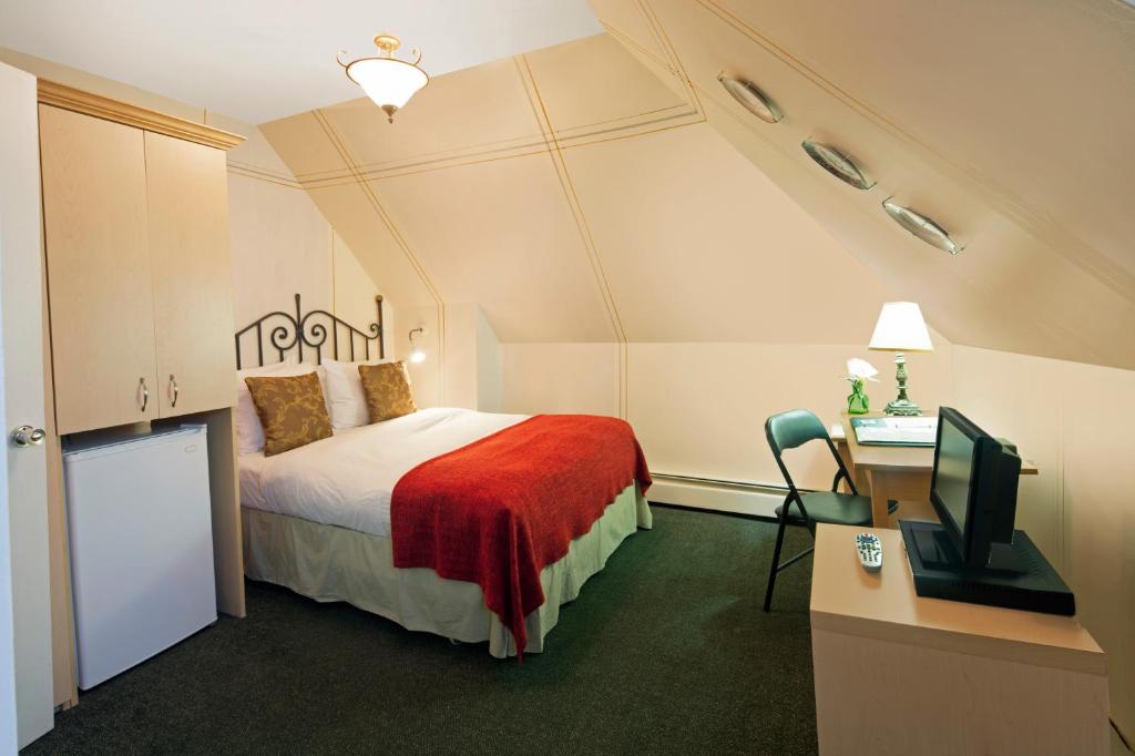 Katil atau katil-katil dalam bilik di Victoria's Mansion Guest House