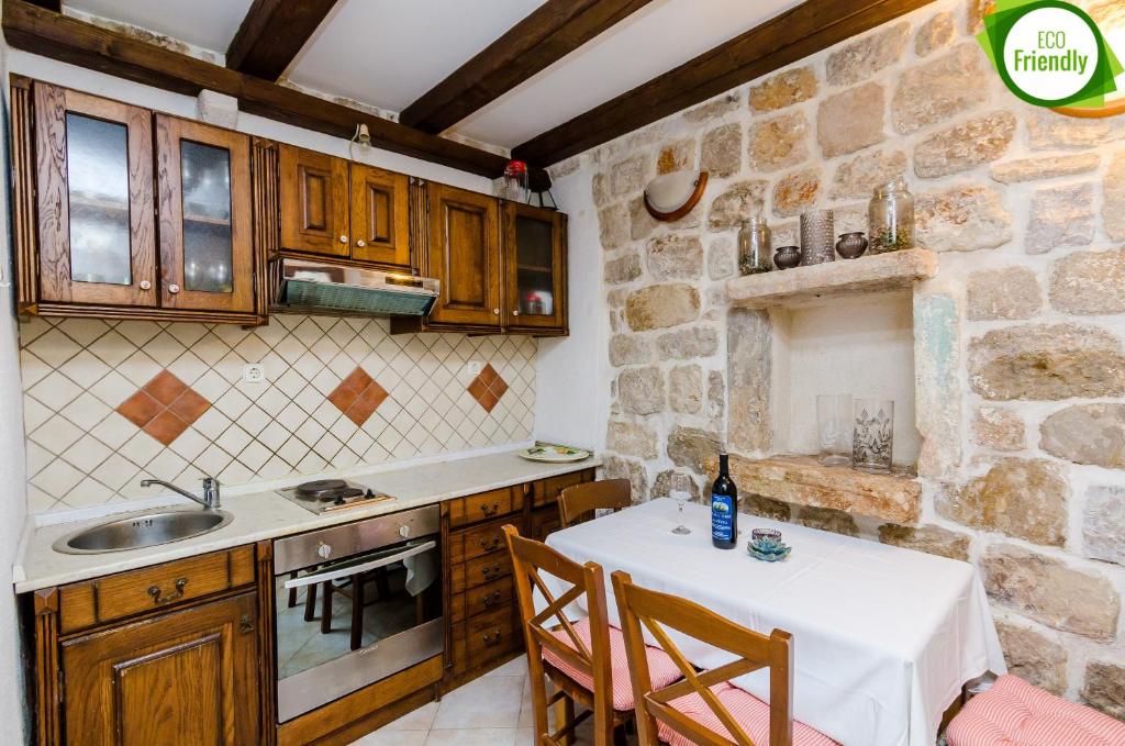 Kuchyň nebo kuchyňský kout v ubytování Holiday Home St George