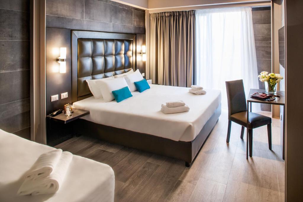 Postel nebo postele na pokoji v ubytování Spice Hotel Milano