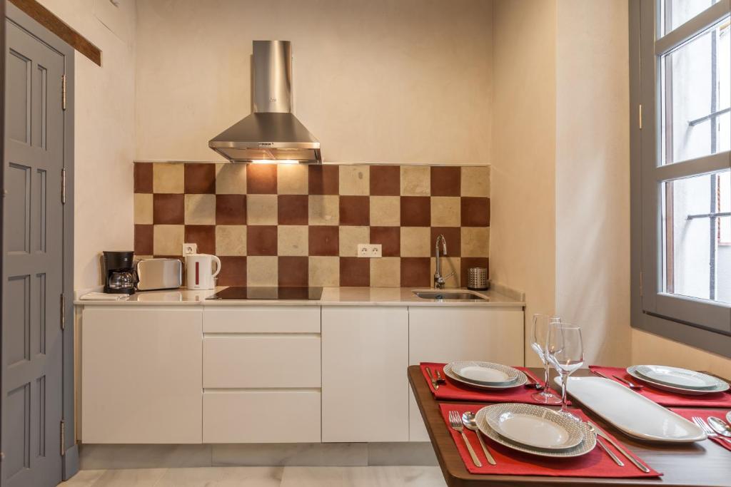 Kuchyň nebo kuchyňský kout v ubytování Casas de Sevilla - Apartamentos Tintes12