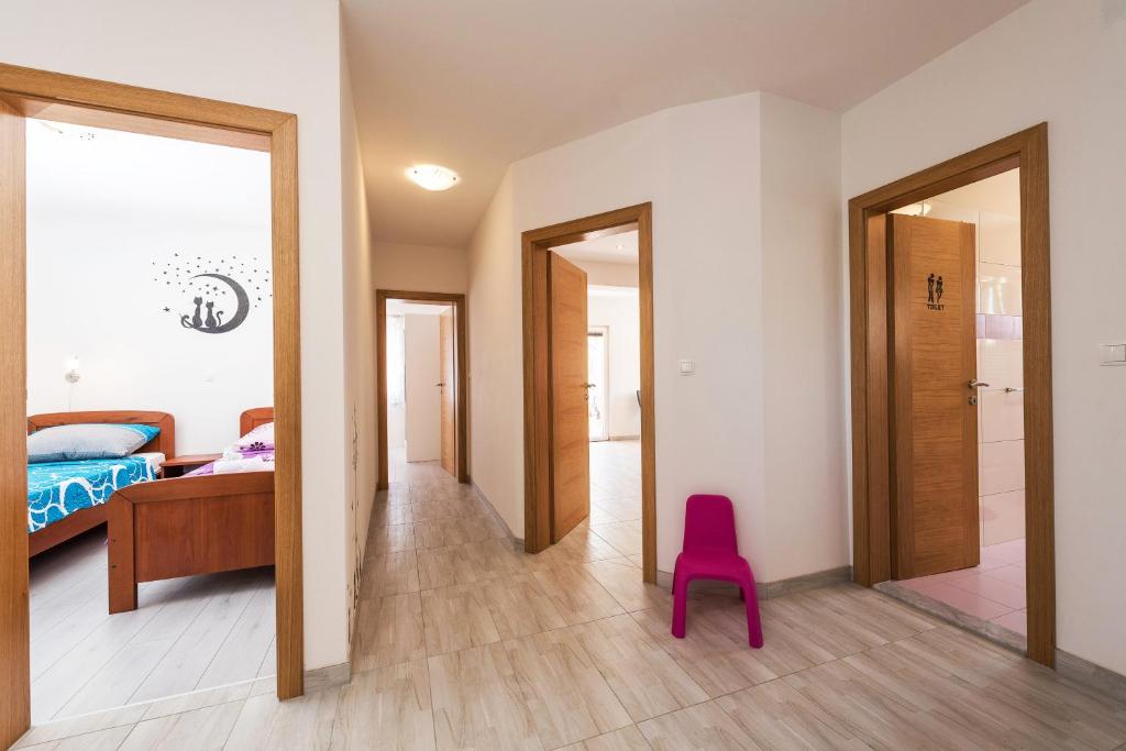 Posteľ alebo postele v izbe v ubytovaní Apartman Micko