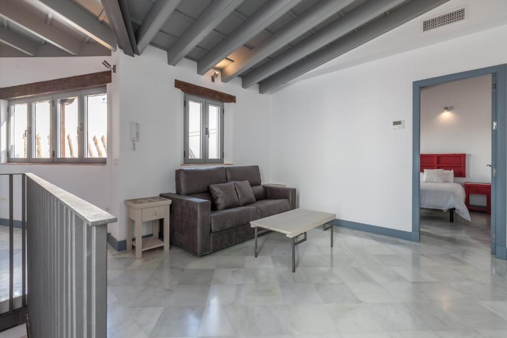 Posezení v ubytování Casas de Sevilla - Apartamentos Tintes12