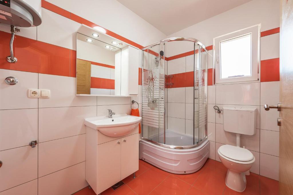Kúpeľňa v ubytovaní Apartman Micko
