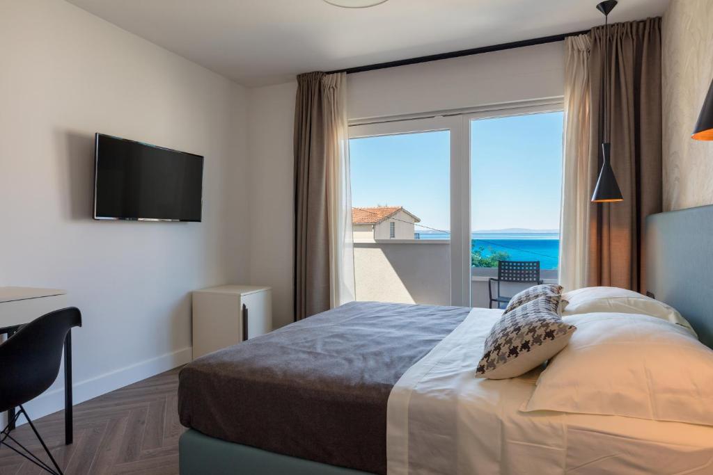 Posteľ alebo postele v izbe v ubytovaní Luxury Villa Karla