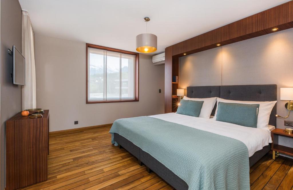 Postel nebo postele na pokoji v ubytování Deltapark Vitalresort Seevillen