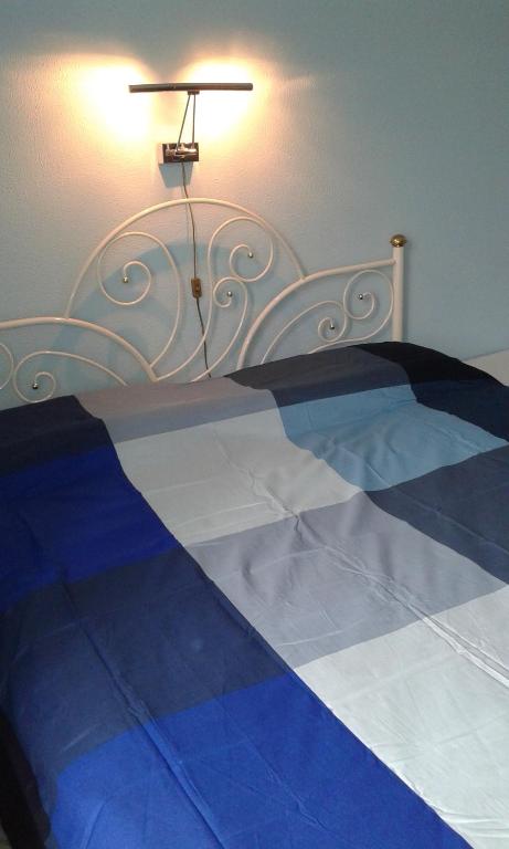 A bed or beds in a room at Appartamento Lauretta