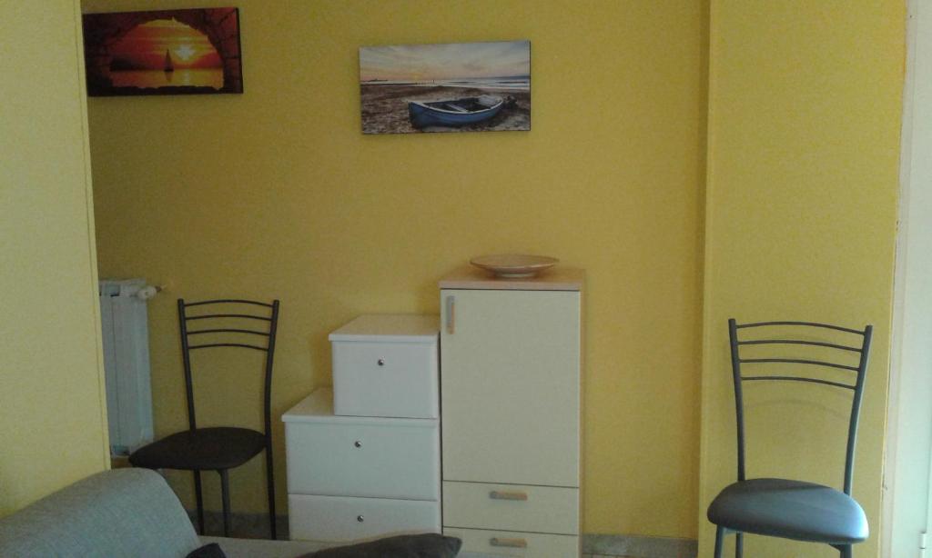A seating area at Appartamento Lauretta