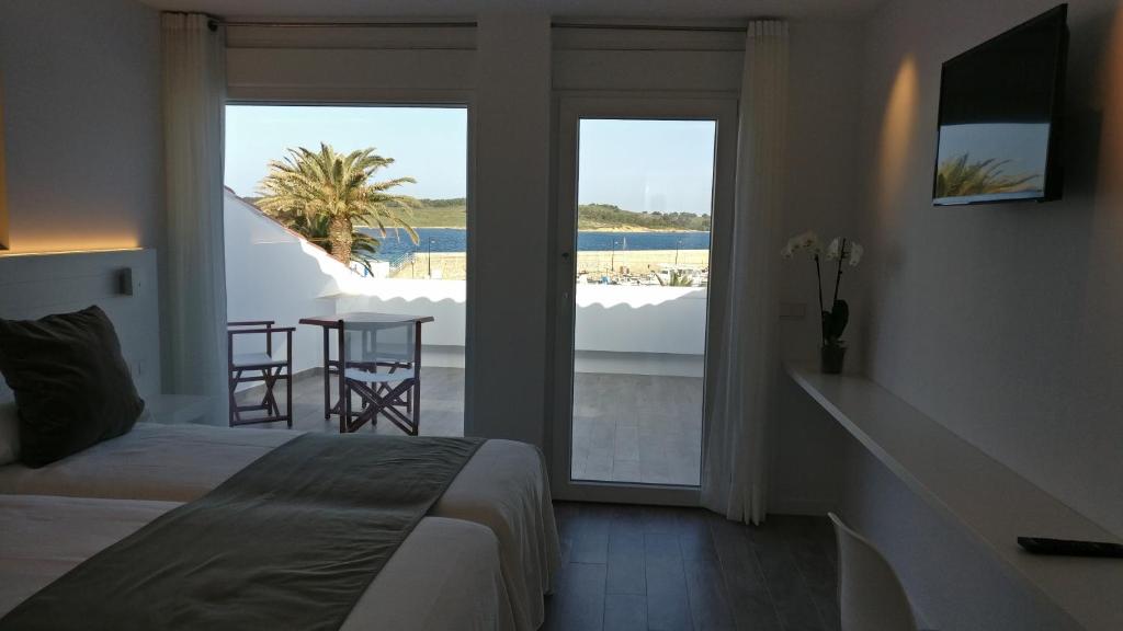 TV a/nebo společenská místnost v ubytování Hostal La Palma